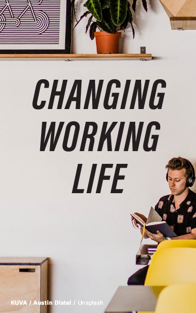 An interior space with a young man reading a book, headphones on, beside a wall with the text "Changing Working Life". A plant and some artwork are also in the frame. Credit: Austin Distel/Unsplash.