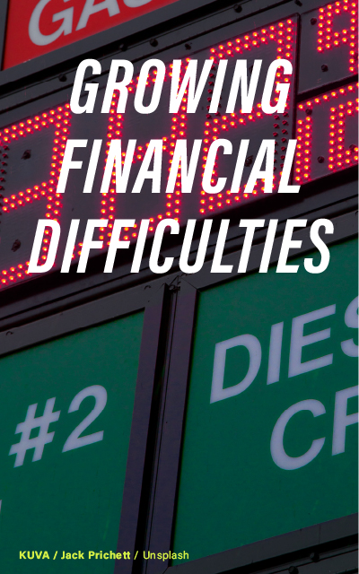 "A close-up view of a gas station price sign illuminated in red with the text 'Growing Financial Difficulties' overlaying the image. Photo by Jack Prichett on Unsplash."